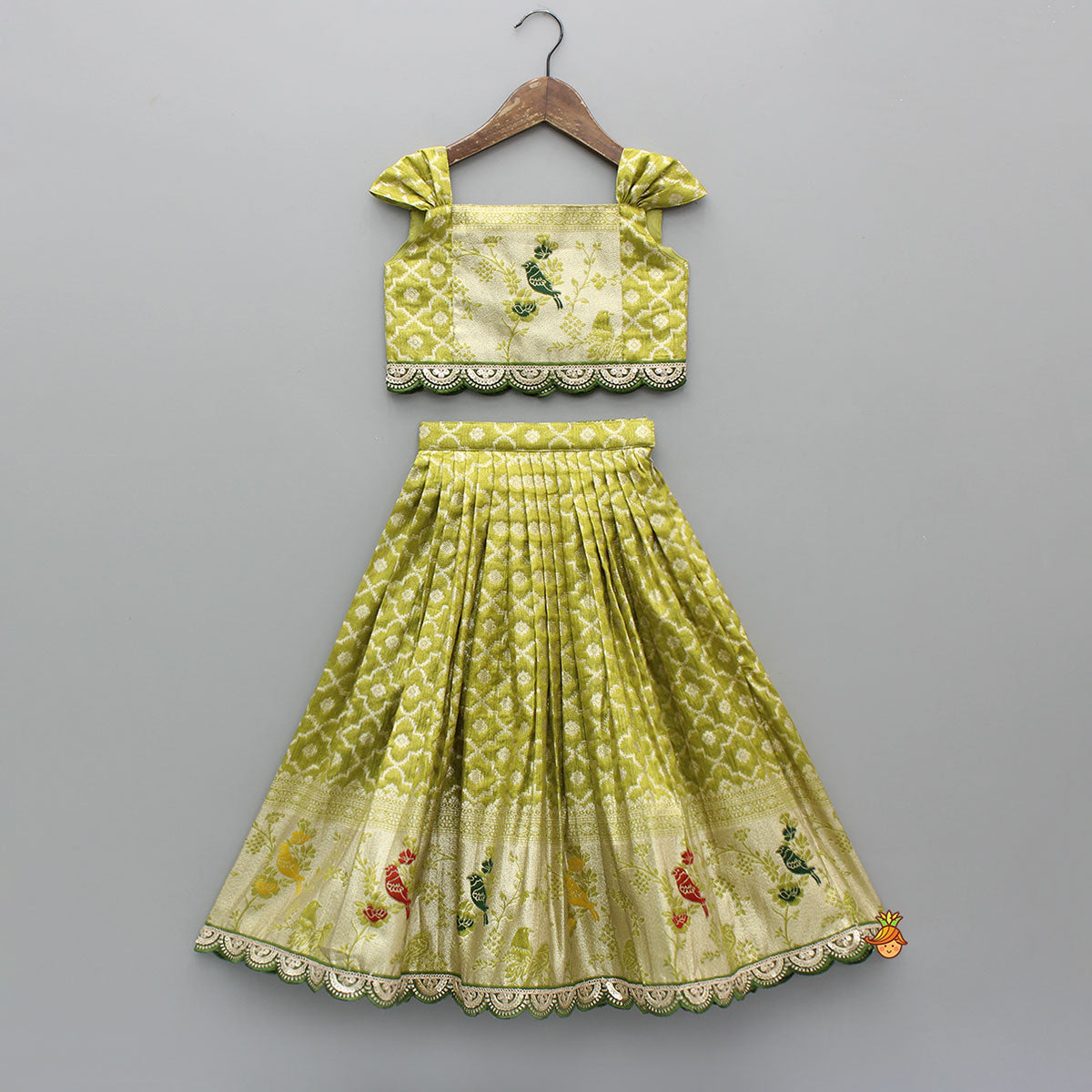 Pre Order: Green Scallop Brocade Top With Pleat Detailed Brocade Lehenga