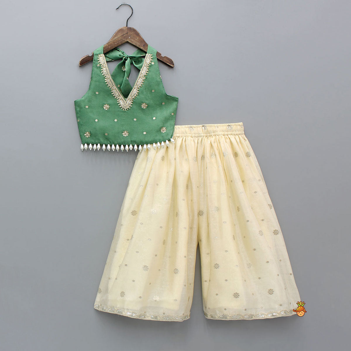 Pre Order: Beautiful Green Embroidered Halter Neck Top With Flared Palazzo