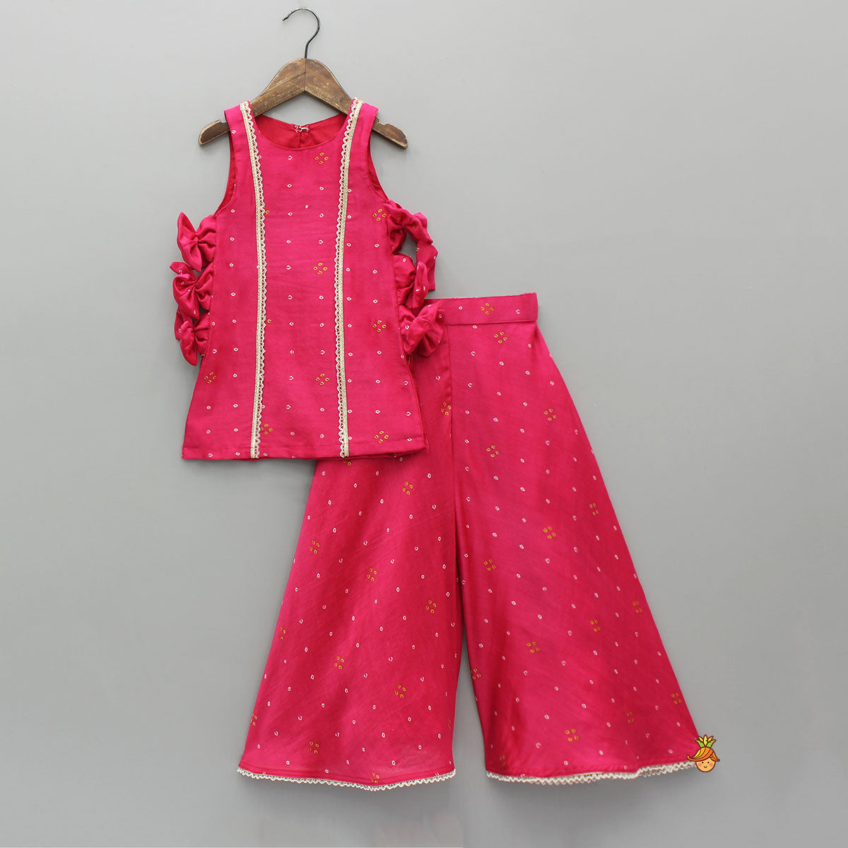 Pre Order: Sleeveless Bow Adorned Bandhani Printed Kurti With Matching Palazzo