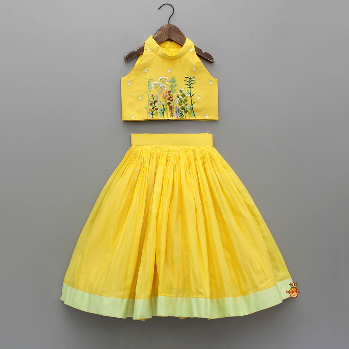 Pre Order: Yellow Halter Neck Floral Embroidered Top With Pleat Detailed Lehenga