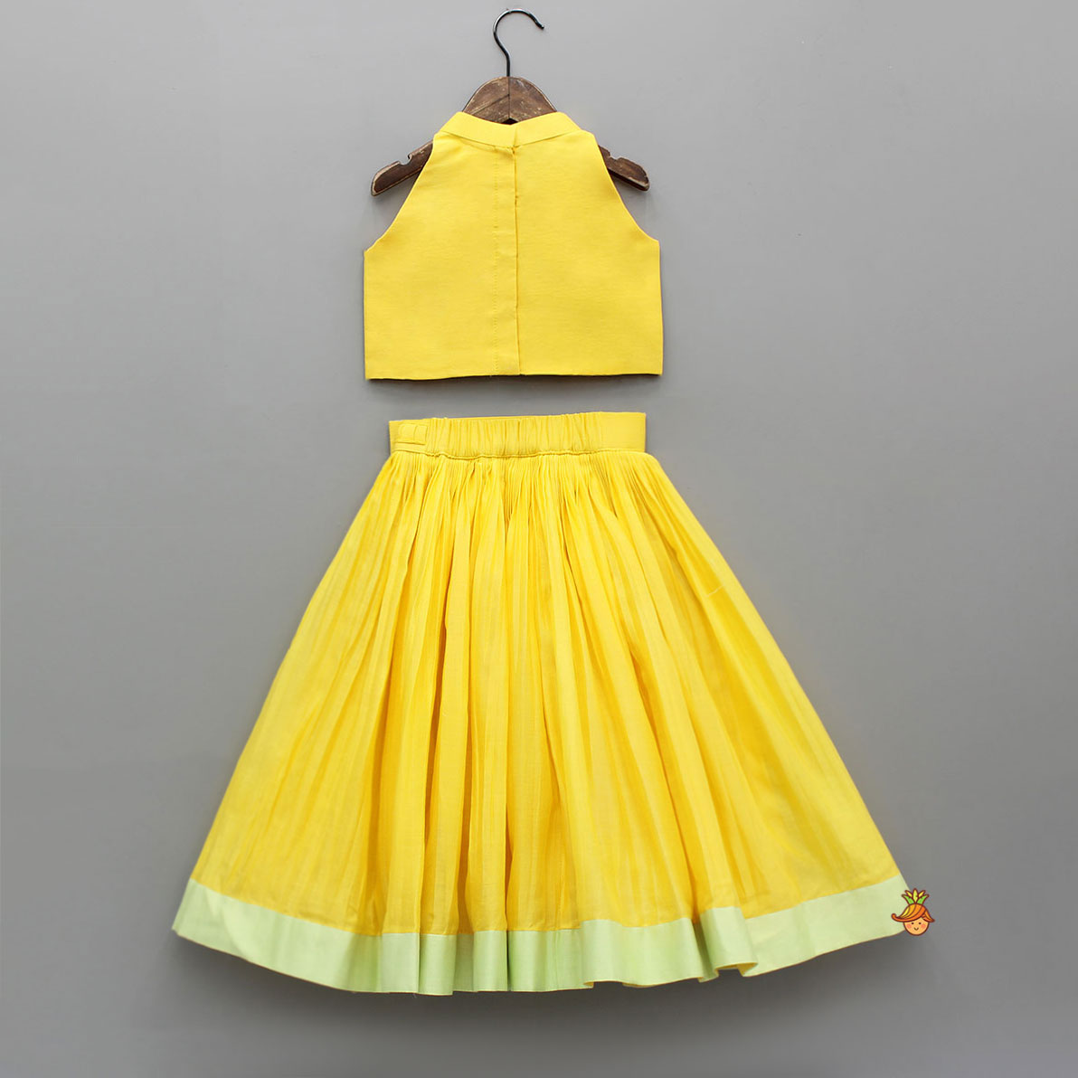 Pre Order: Yellow Halter Neck Floral Embroidered Top With Pleat Detailed Lehenga