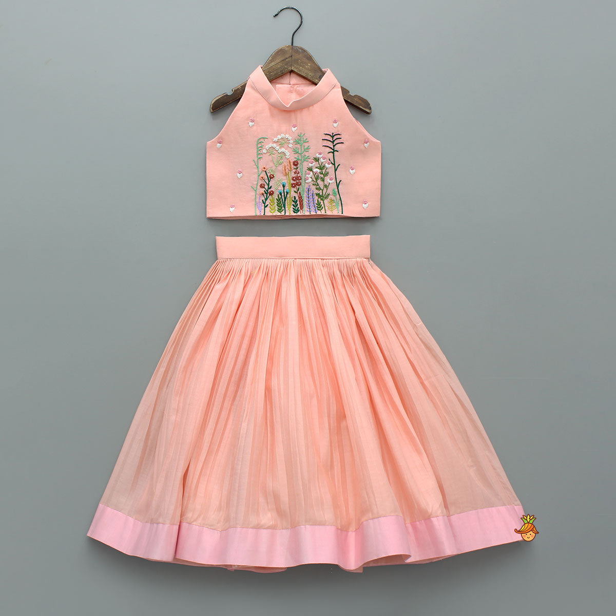 Pre Order: Halter Neck Floral Embroidered Peach Top With Pleat Detailed Lehenga
