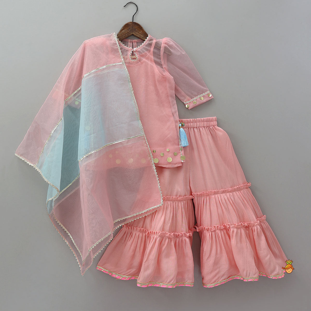 Pre Order: Elegant Strappy Top With Embellished Kurti And Ruffled Sharara With Dupatta