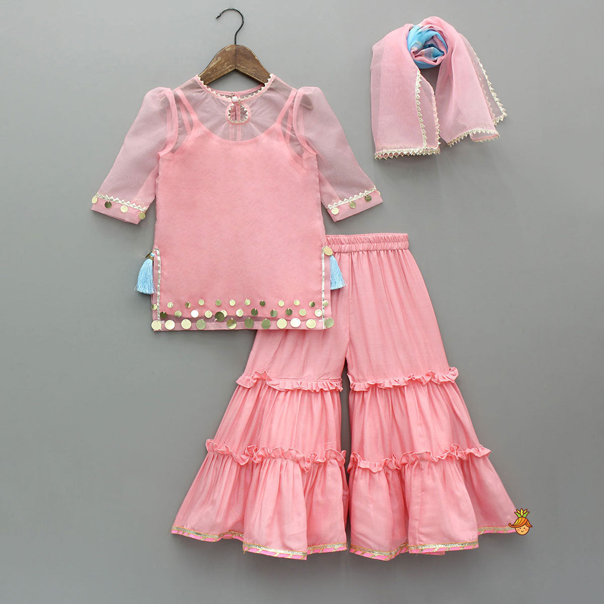 Pre Order: Elegant Strappy Top With Embellished Kurti And Ruffled Sharara With Dupatta