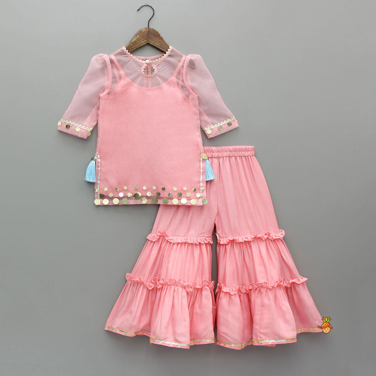 Pre Order: Elegant Strappy Top With Embellished Kurti And Ruffled Sharara With Dupatta