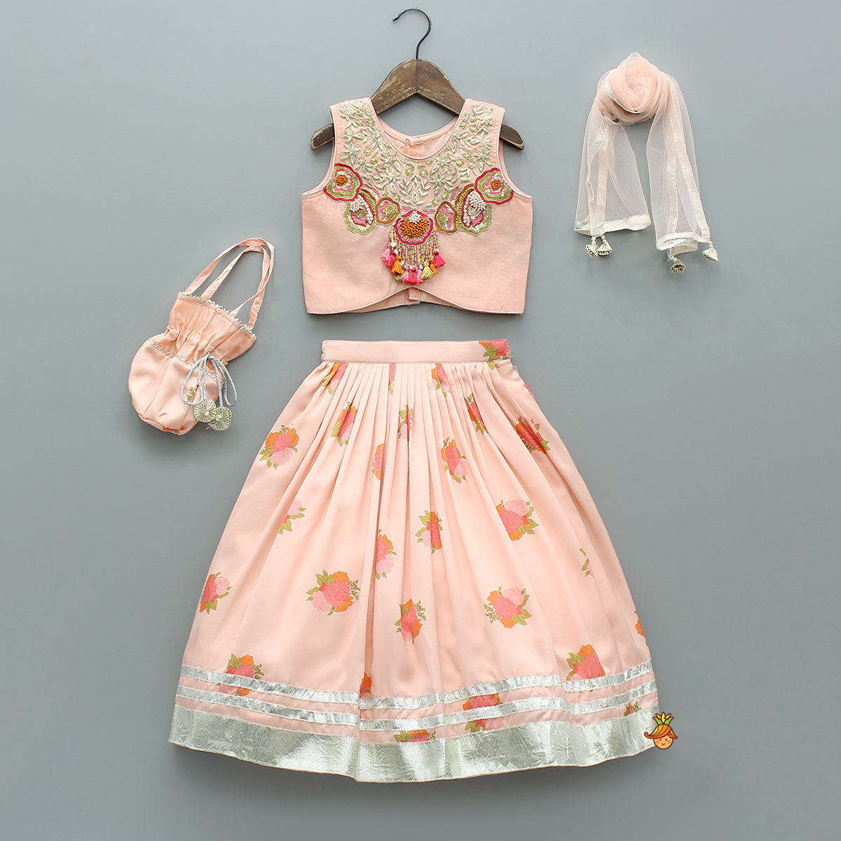 Pre Order: Fringe-Detailed Embroidered Top With Lehenga And Net Dupatta With Matching Potli Bag