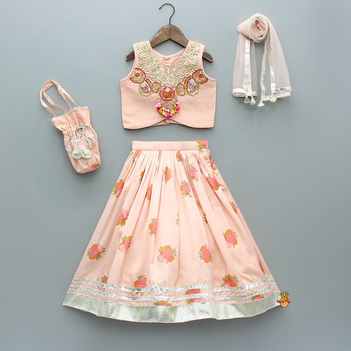Pre Order: Fringe-Detailed Embroidered Top With Lehenga And Net Dupatta With Matching Potli Bag
