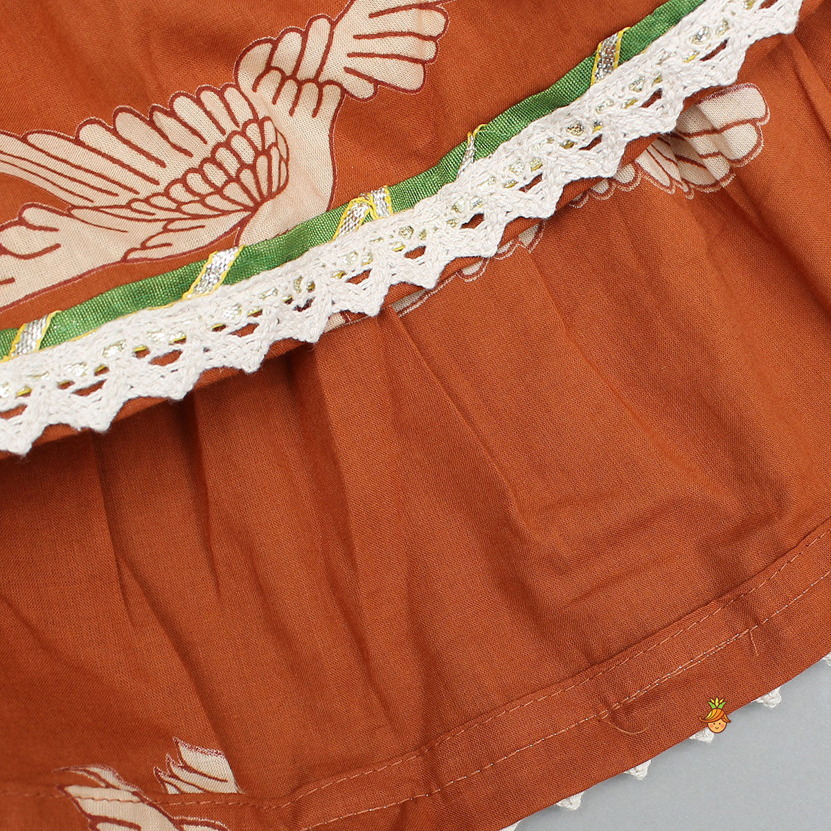 Pre Order: Bird-Printed Sleeveless Ethnic Top With Tiered Lehenga