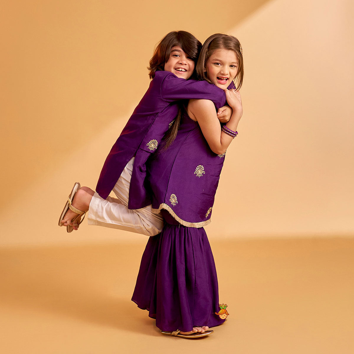 Sequin Embroidered Pleat Detailed Kurti With Sharara And Dupatta twinning model image 1