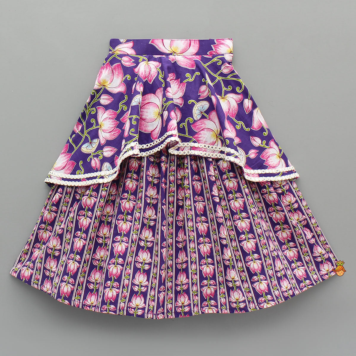 Pre Order: Lotus Embroidered Top And Layered Lehenga With Dupatta And Fringed Potli Bag