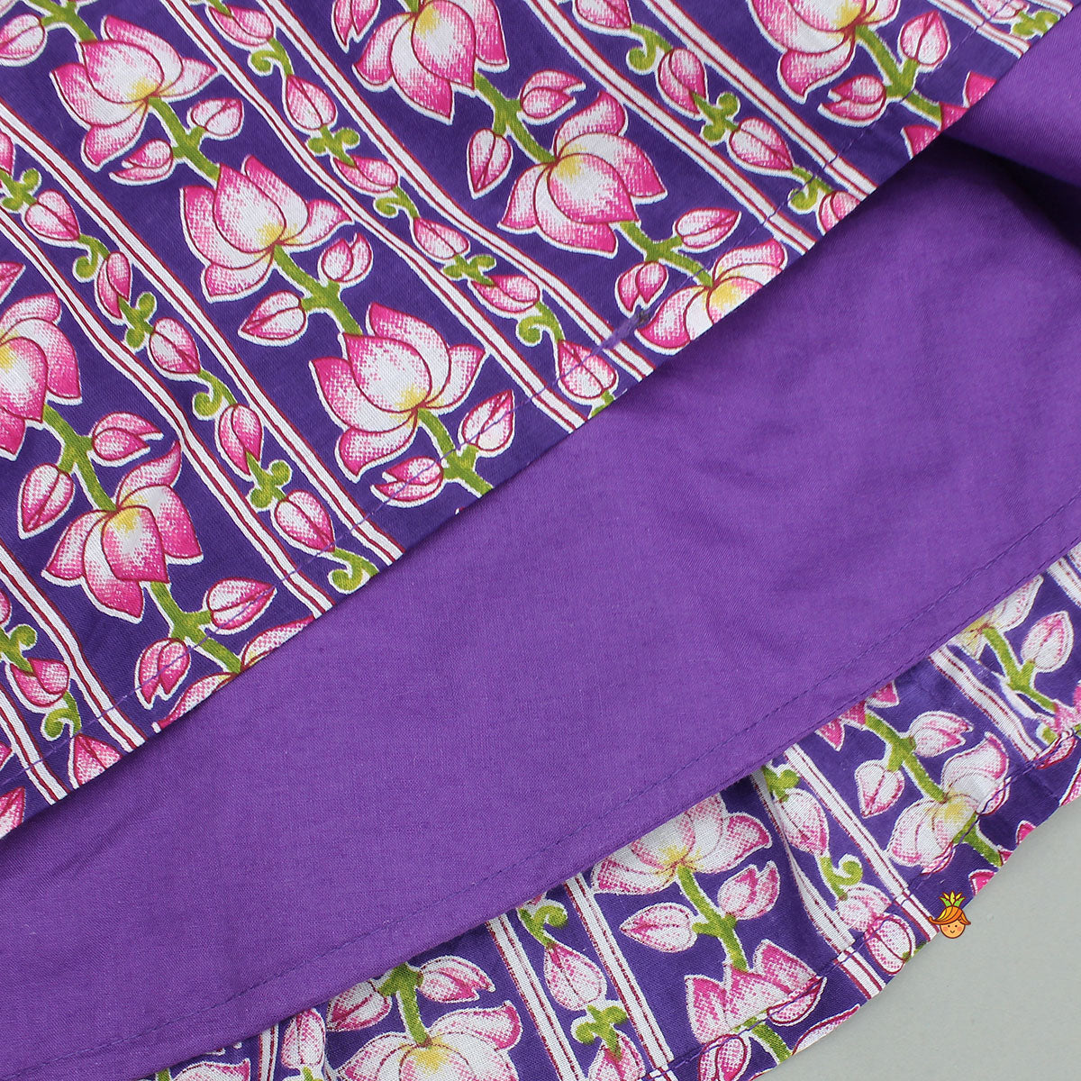 Pre Order: Lotus Embroidered Top And Layered Lehenga With Dupatta And Fringed Potli Bag