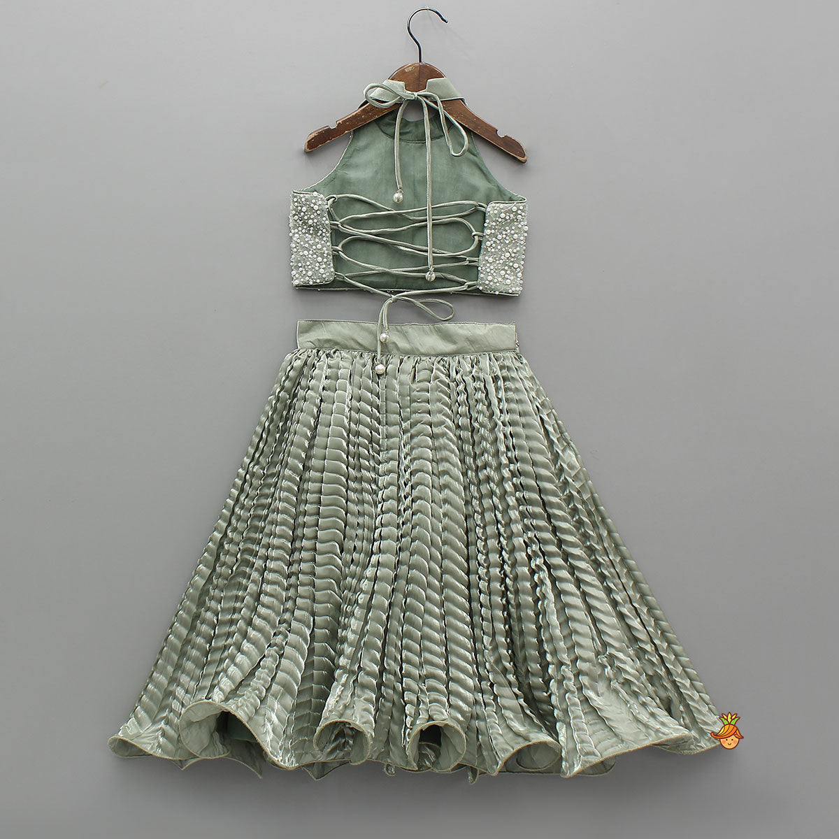 Pre Order: Gorgeous Open-Back Top And Crushed Lehenga With Wrist Cuff