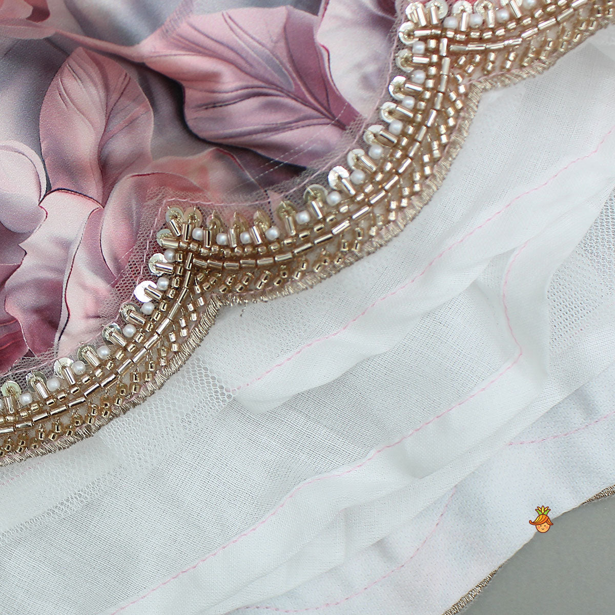 Pre Order: Printed Strappy Top And Graceful Layered Lehenga