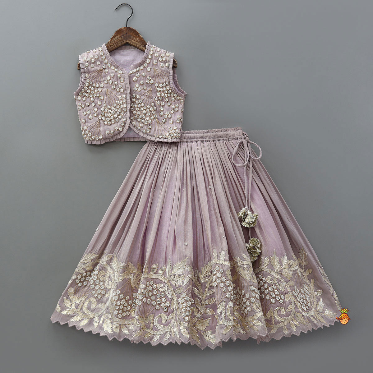 Pre Order: Embroidered Stylish Hem Shimmery Top And Pleated Lehenga With Net Dupatta
