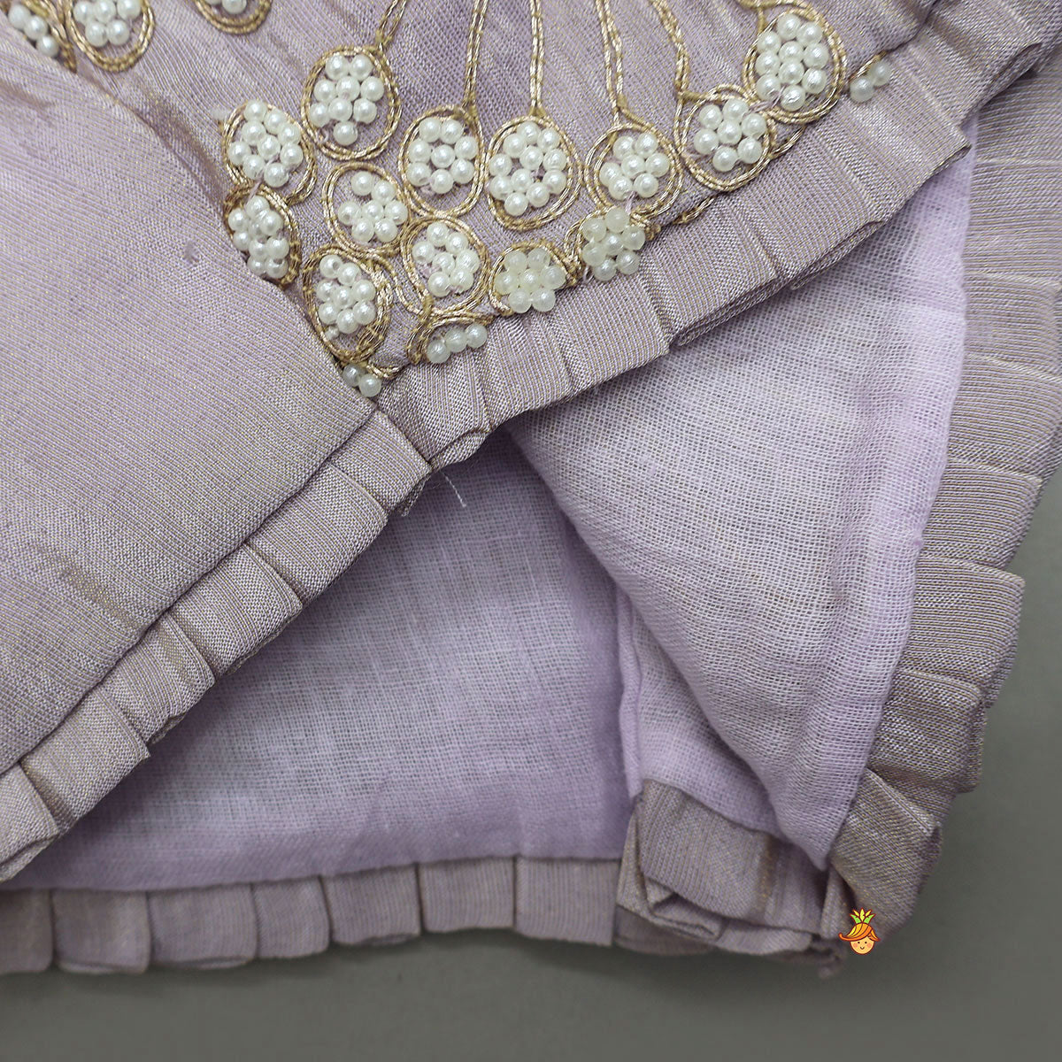 Pre Order: Embroidered Stylish Hem Shimmery Top And Pleated Lehenga With Net Dupatta