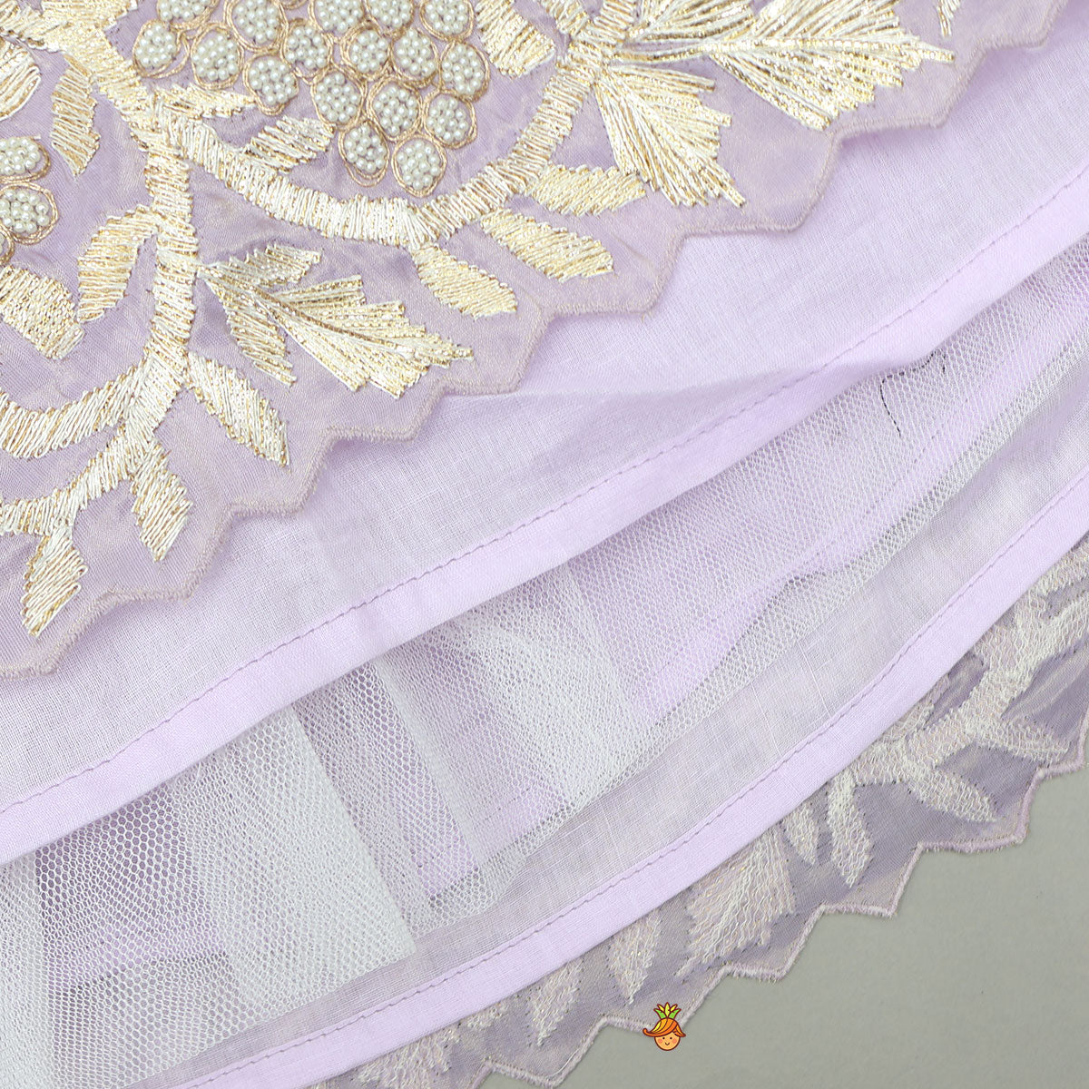 Pre Order: Embroidered Stylish Hem Shimmery Top And Pleated Lehenga With Net Dupatta