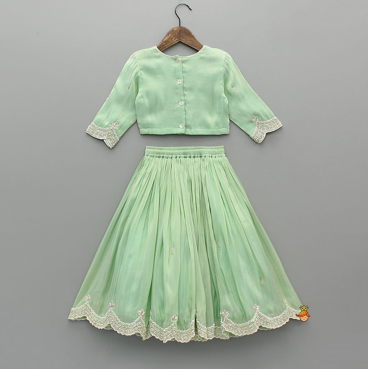 Pre Order: Stylish Hem Embroidered Top And Scalloped Lehenga