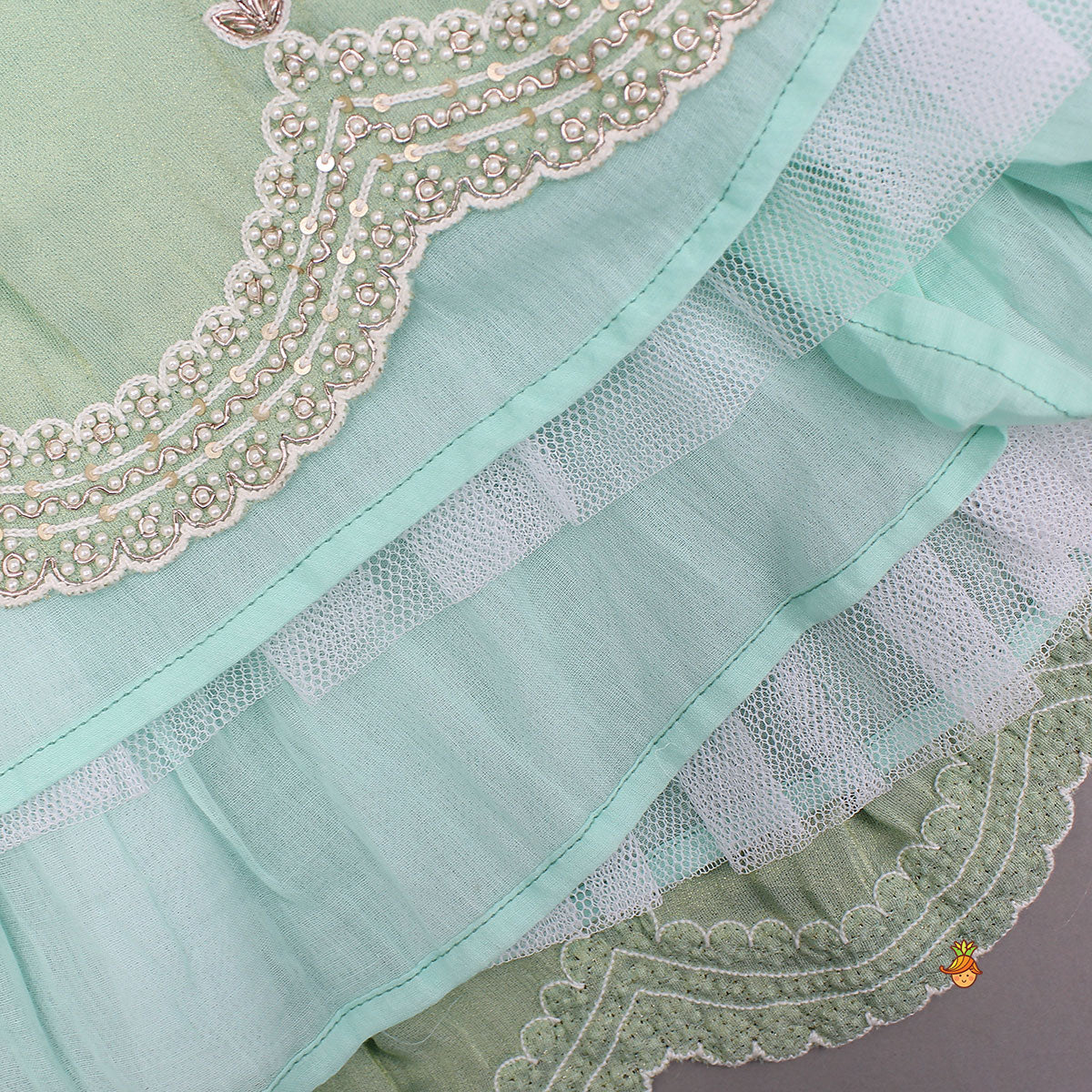 Pre Order: Stylish Hem Embroidered Top And Scalloped Lehenga