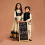 Shimmery Stylish Cut Hem Kurta With Velvet Jacket And Pyjama twinning model image 1