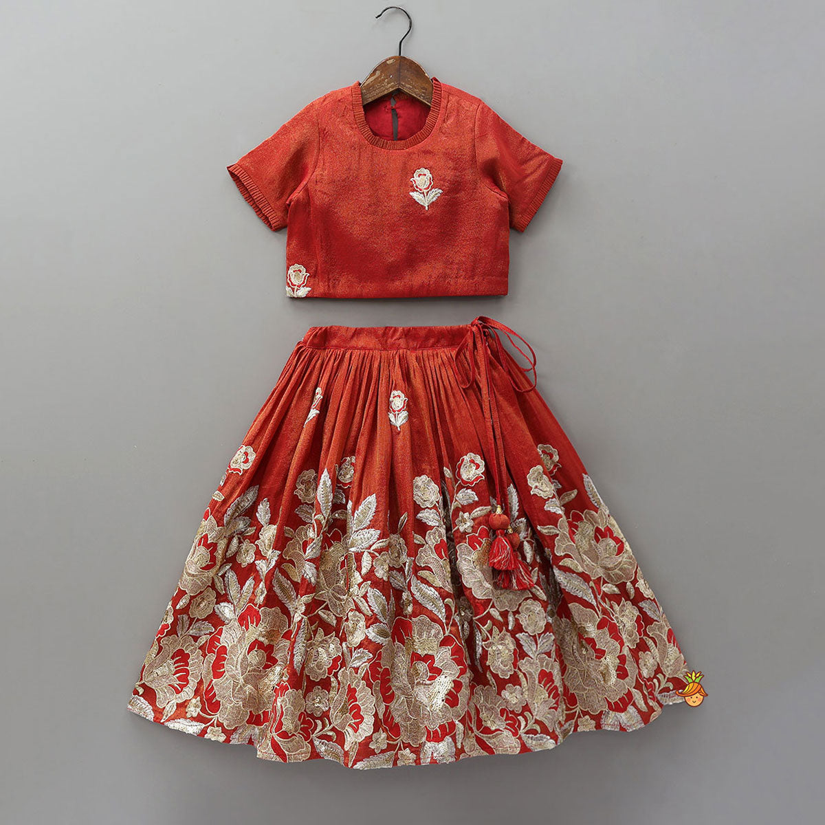 Pre Order: Intricately Flower-Embroidered Shimmery Top And Lehenga