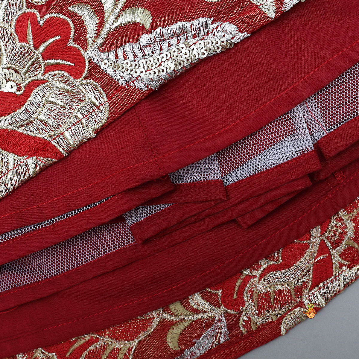 Pre Order: Intricately Flower-Embroidered Shimmery Top And Lehenga