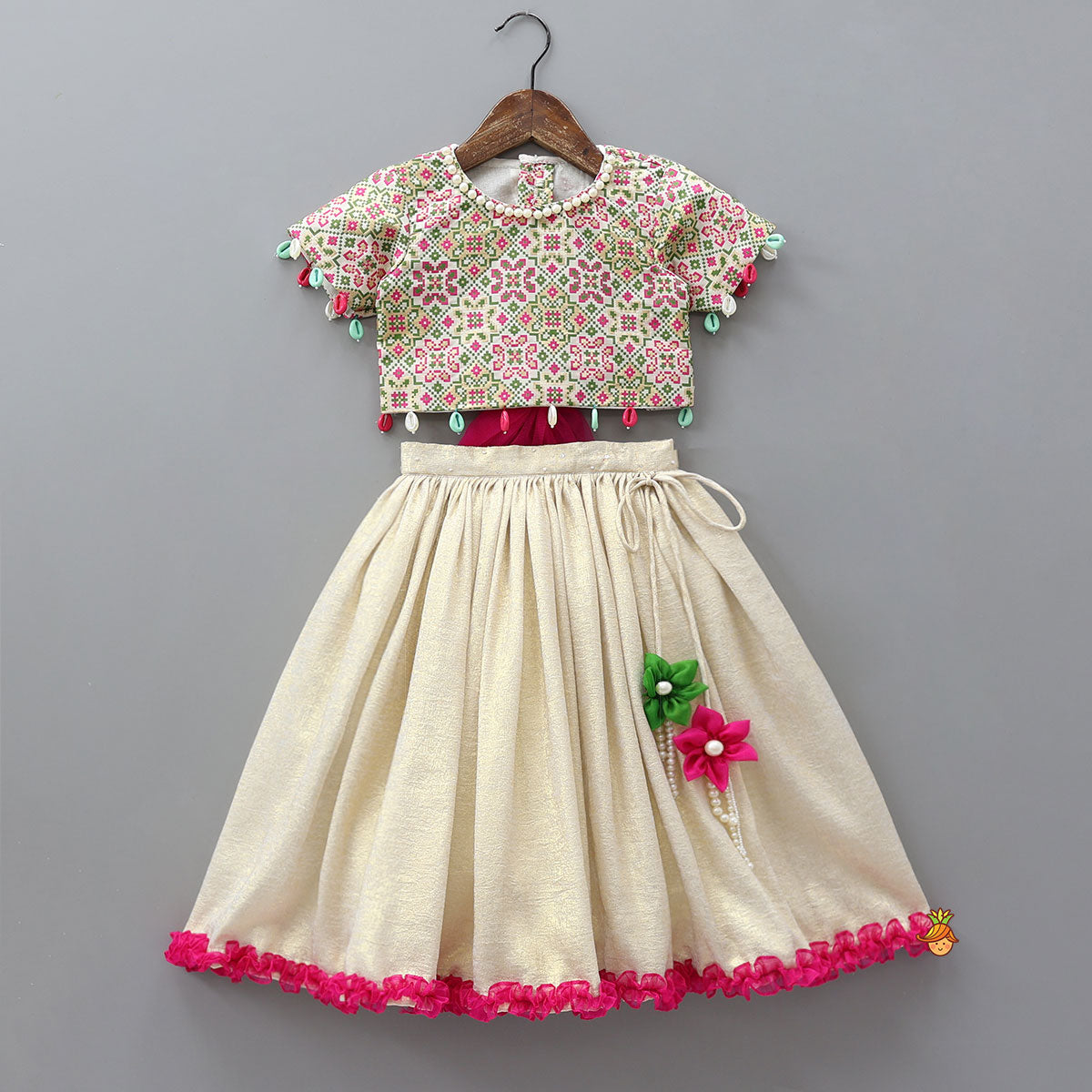 Pre Order: Back Knot Detail Top And Shimmery Lehenga