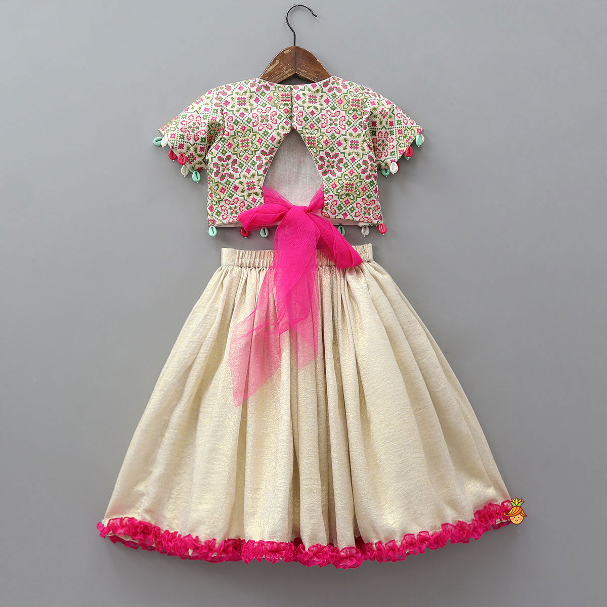 Pre Order: Back Knot Detail Top And Shimmery Lehenga