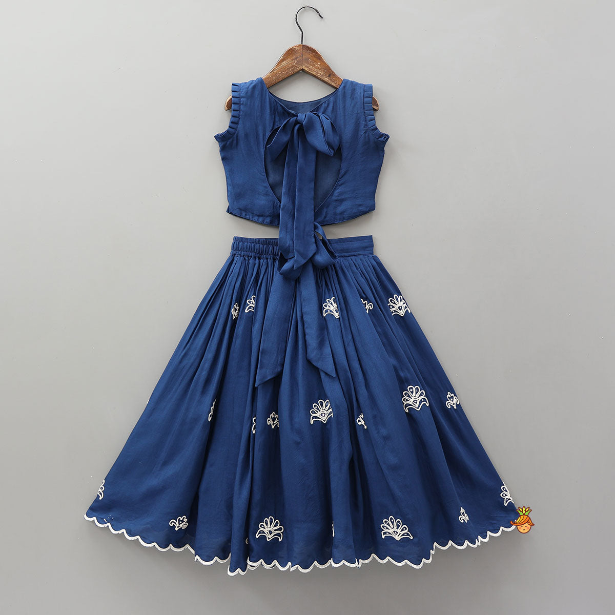 Pre Order: Dual Back Knot Detail Top And Tassels Enhanced Lehenga