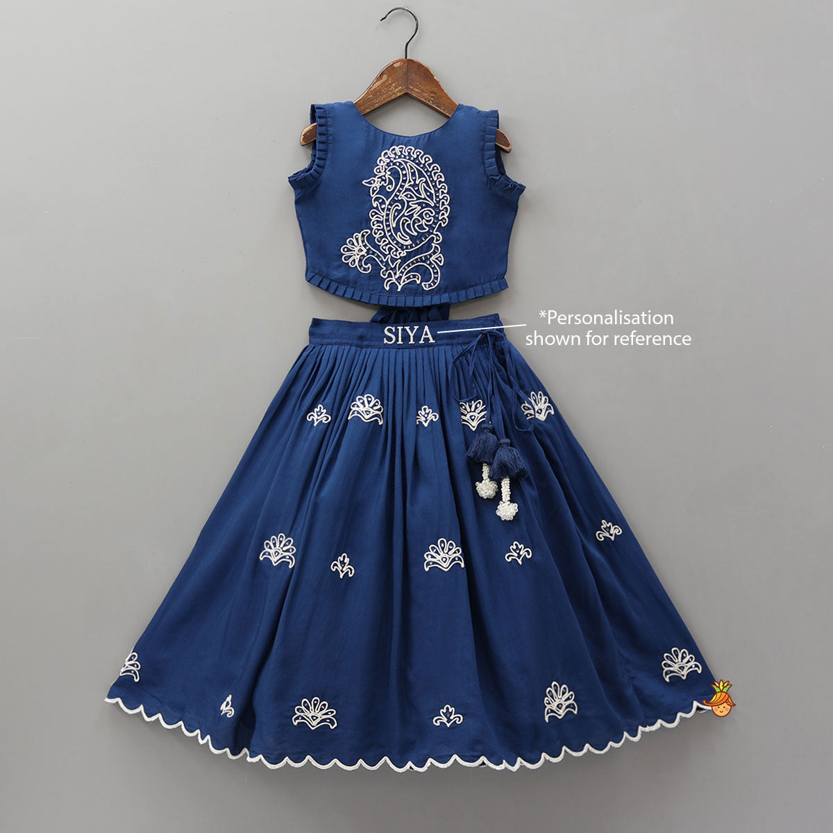 Pre Order: Dual Back Knot Detail Top And Tassels Enhanced Lehenga
