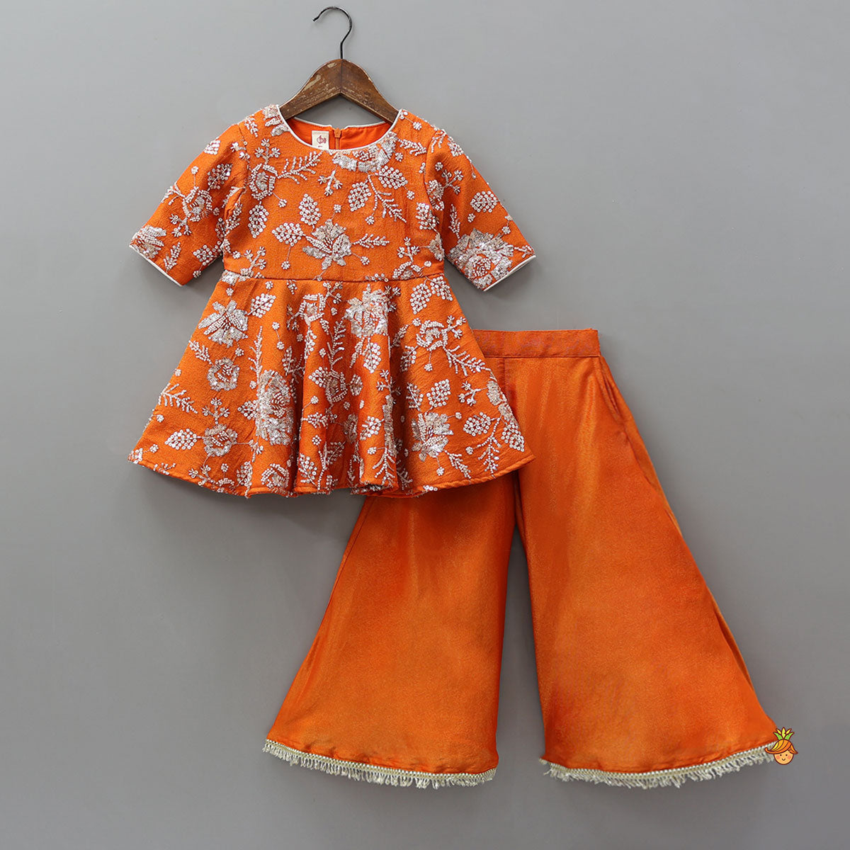 Pre Order: Intricate Beads And Cut Dana Embroidered Kurti With Flared Palazzo