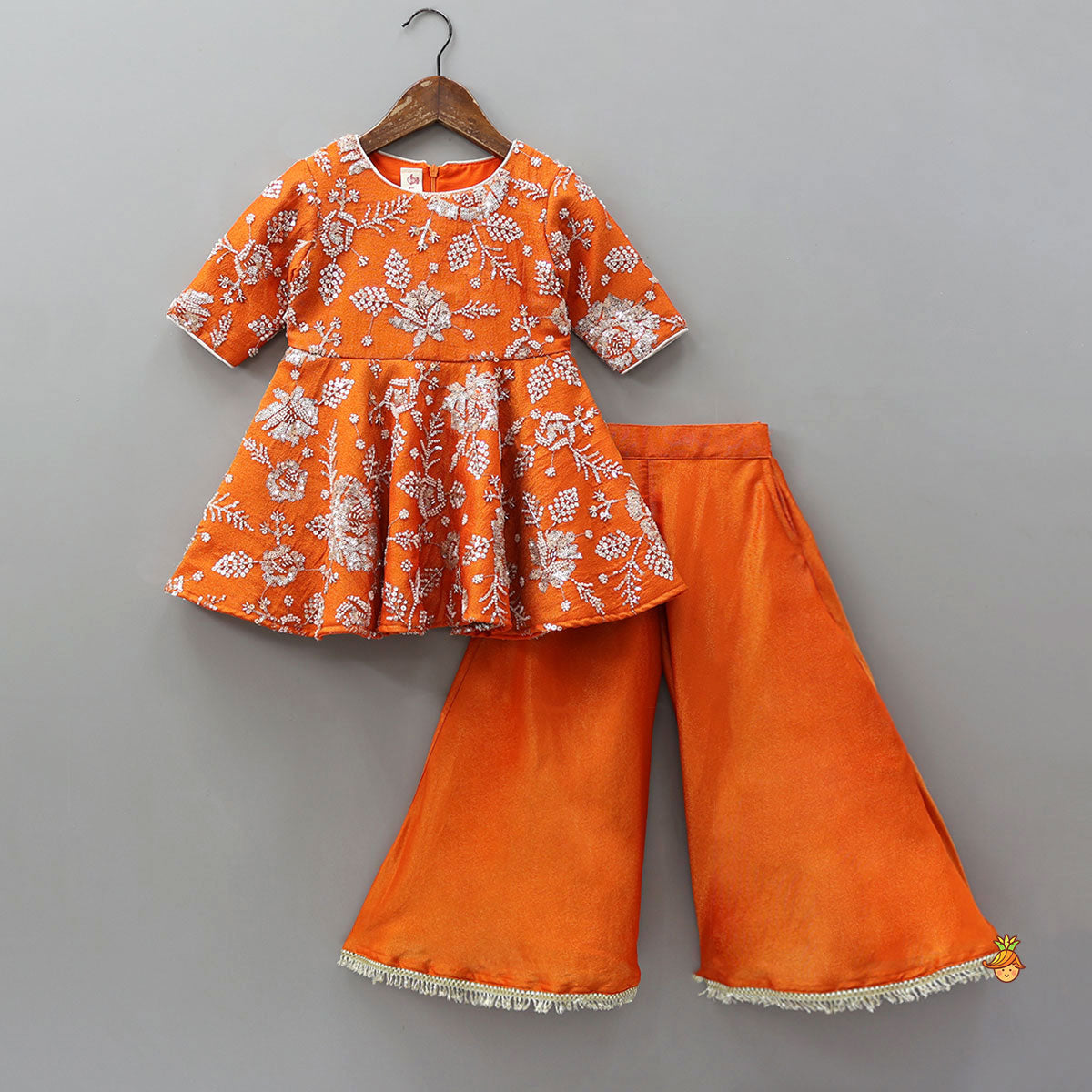 Pre Order: Intricate Beads And Cut Dana Embroidered Kurti With Flared Palazzo