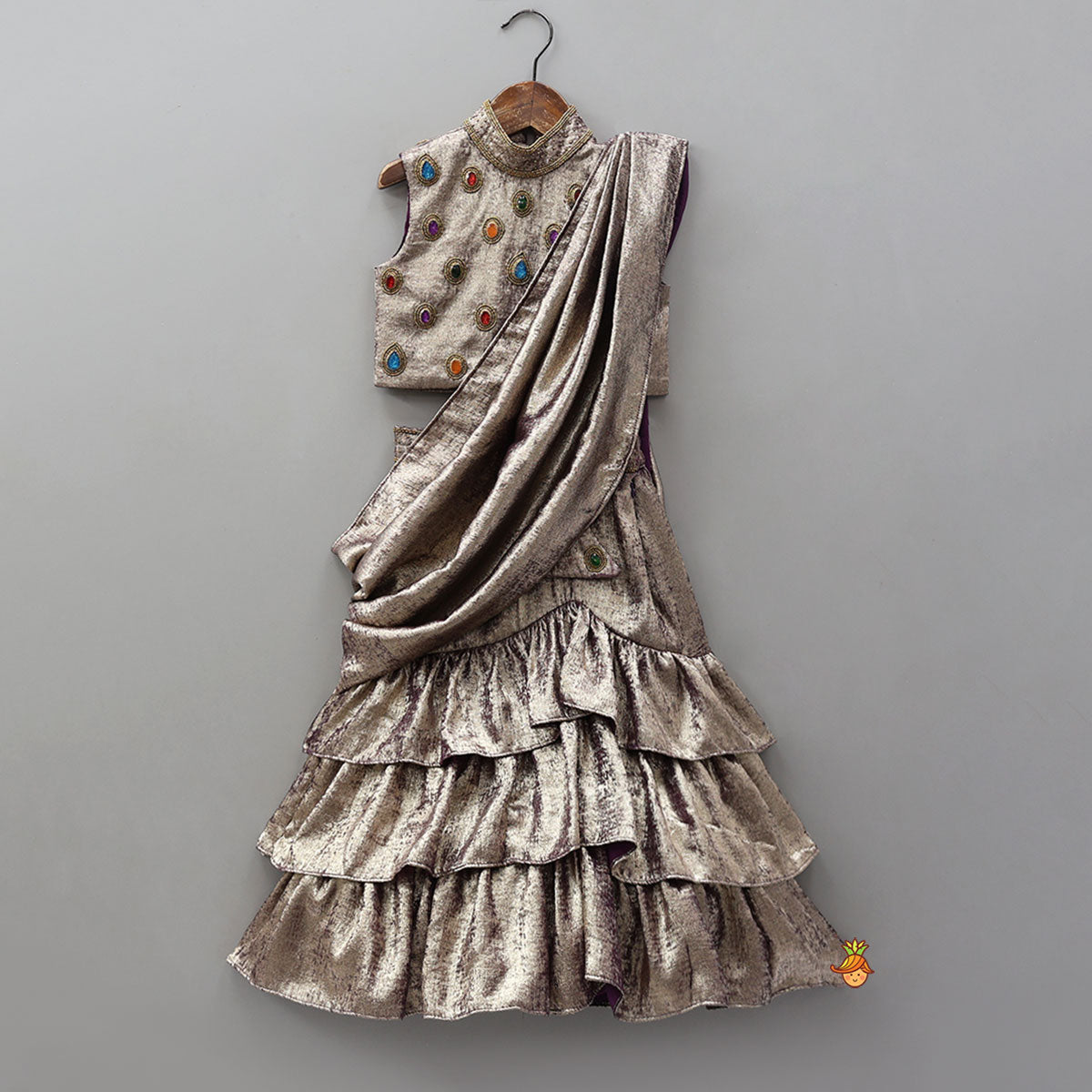 Pre Order: Sleeveless Shiny Top With Layered Lehenga And Attached Dupatta