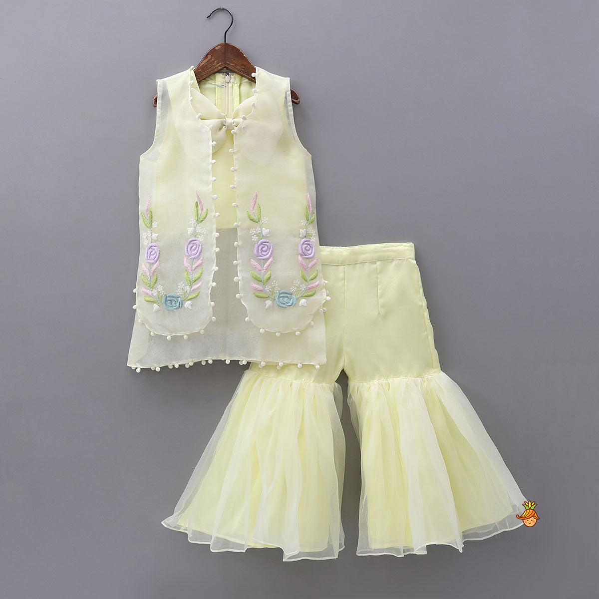 Pre Order: Bow Adorned Inner Top With Hand Embroidered Jacket And Sharara With Floral Sling Bag