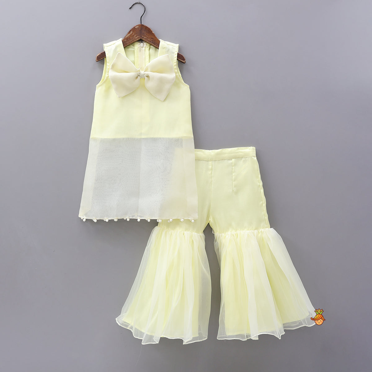 Pre Order: Bow Adorned Inner Top With Hand Embroidered Jacket And Sharara With Floral Sling Bag