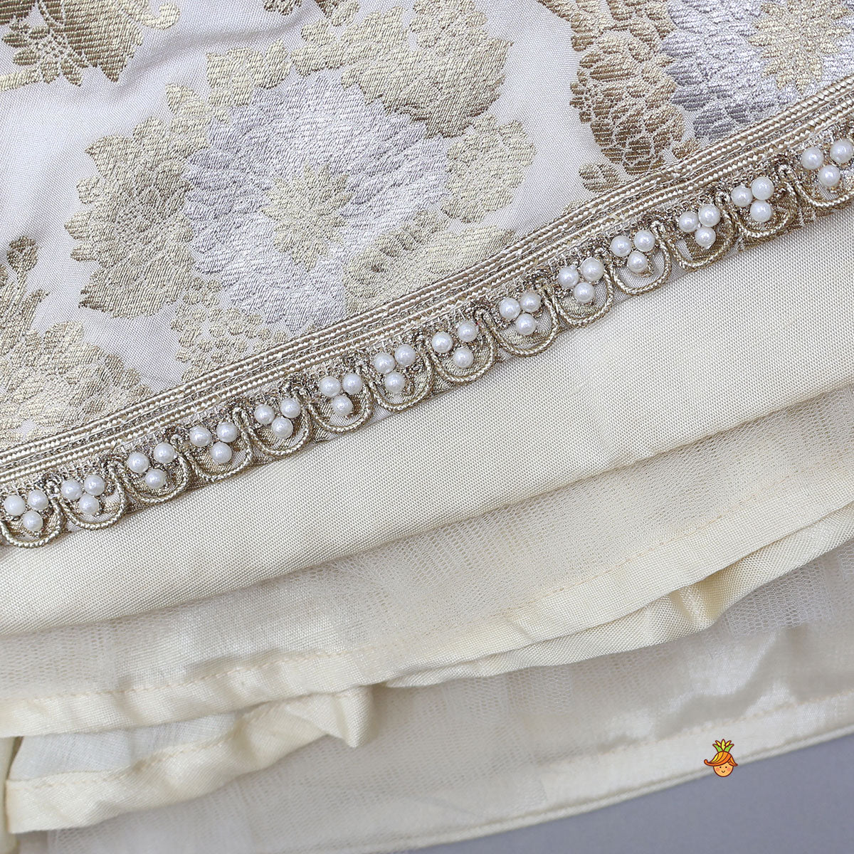 Pre Order: Exquisite Halter Neck Brocade Top With Embellished Jacket And Brocade Lehenga With Matching Hair Band