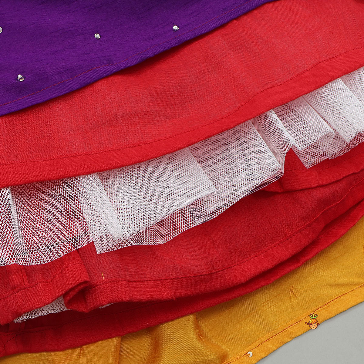 Pre Order: Elegant Top And Multi-Panel Colour-Block Lehenga With Mirror Work Dupatta