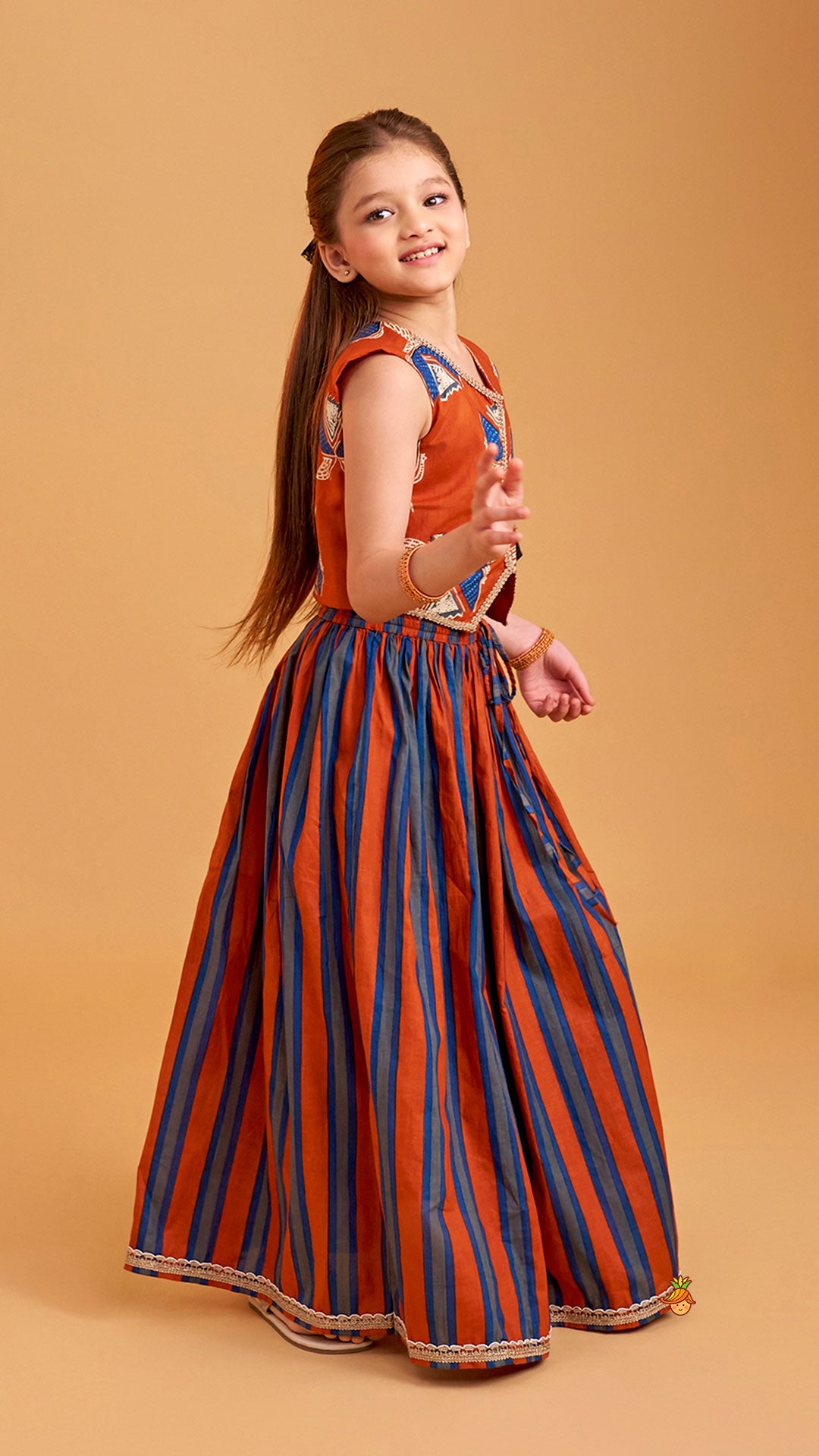 Pre Order: Faux Pocket Printed Top And Striped Lehenga