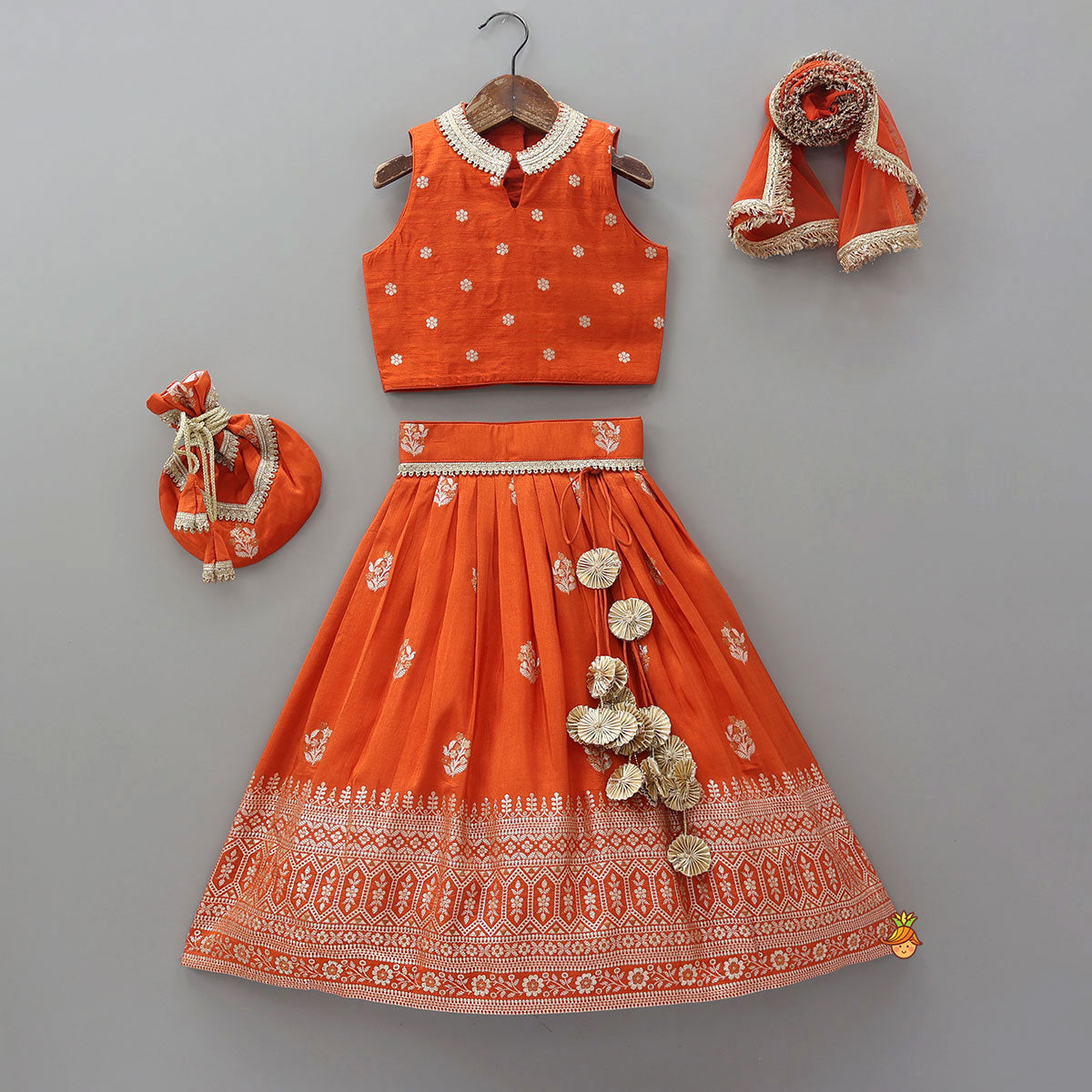 Pre Order: Beautiful Floral Motif Work Top And Lehenga With Matching Dupatta And Potli Bag