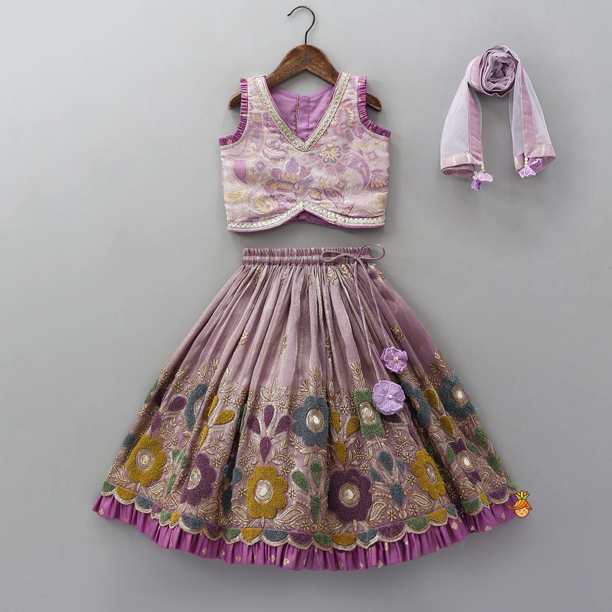 Pre Order: Pleated Armhole Top And Shimmery Lehenga With Matching Net Dupatta