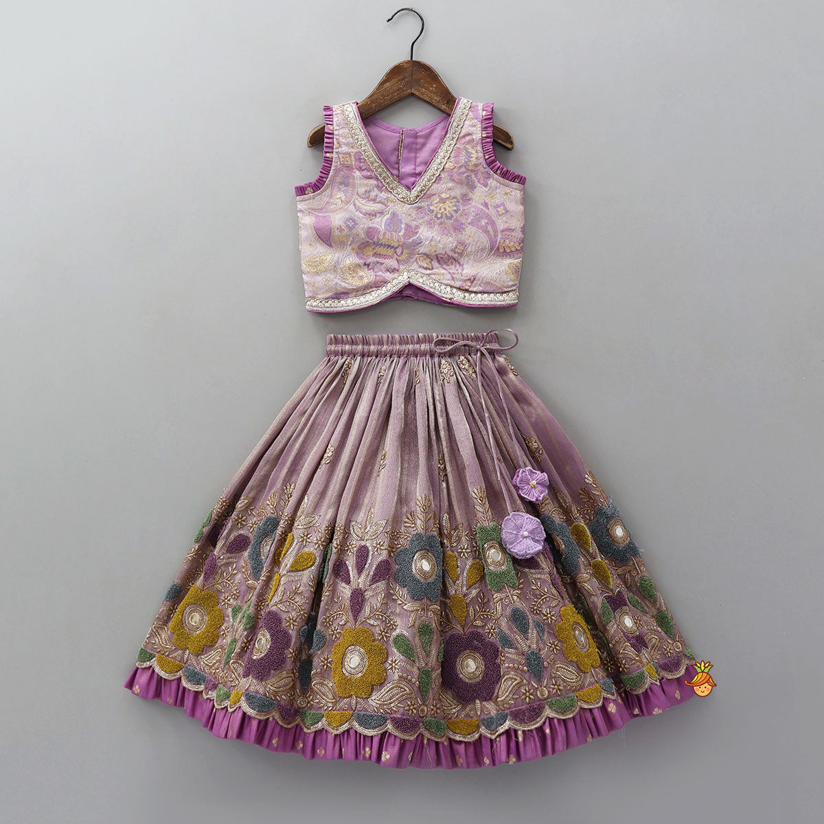 Pre Order: Pleated Armhole Top And Shimmery Lehenga With Matching Net Dupatta