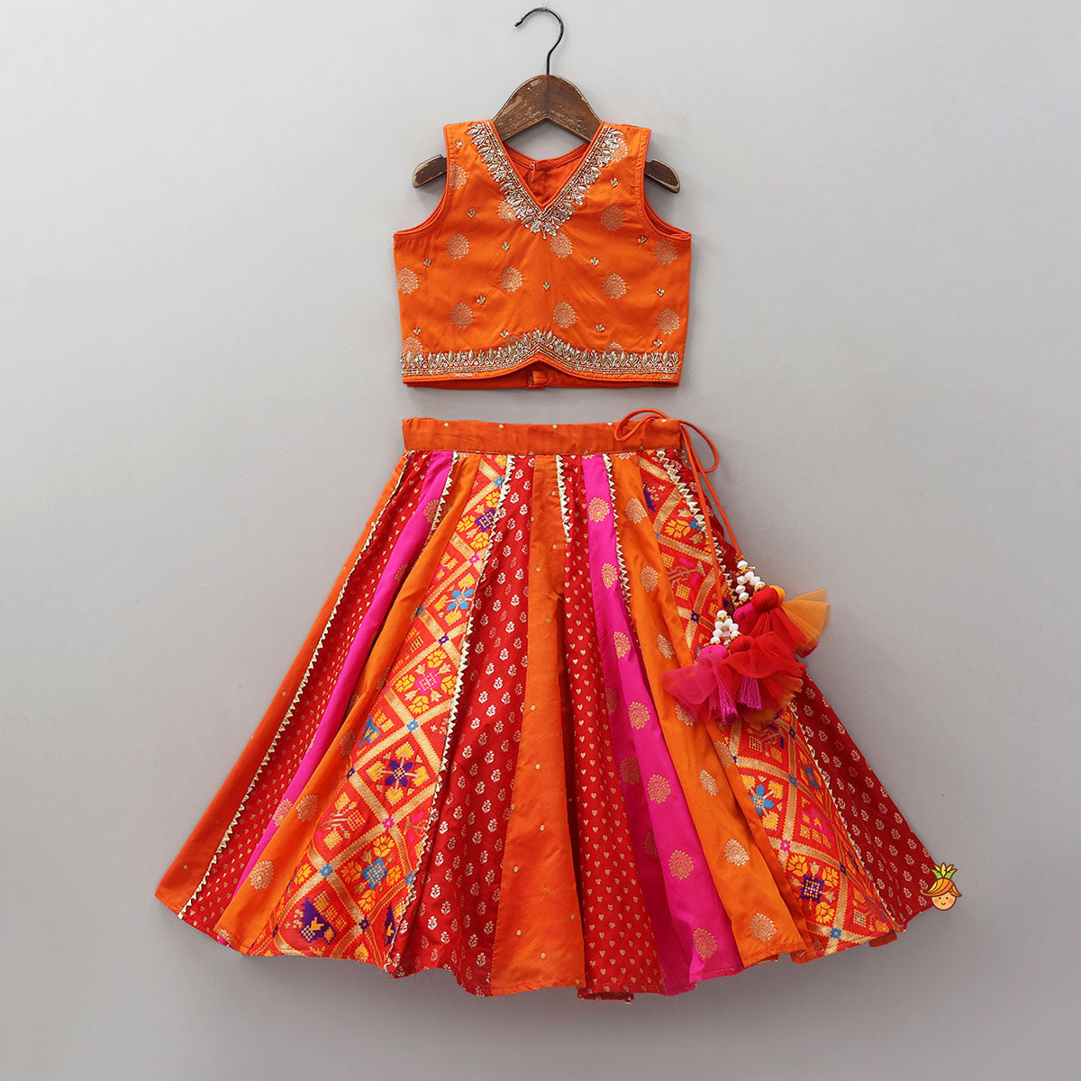 Pre Order: Embroidered Elegant Top And Brocade Lehenga With Matching Net Dupatta And Brocade Potli Bag
