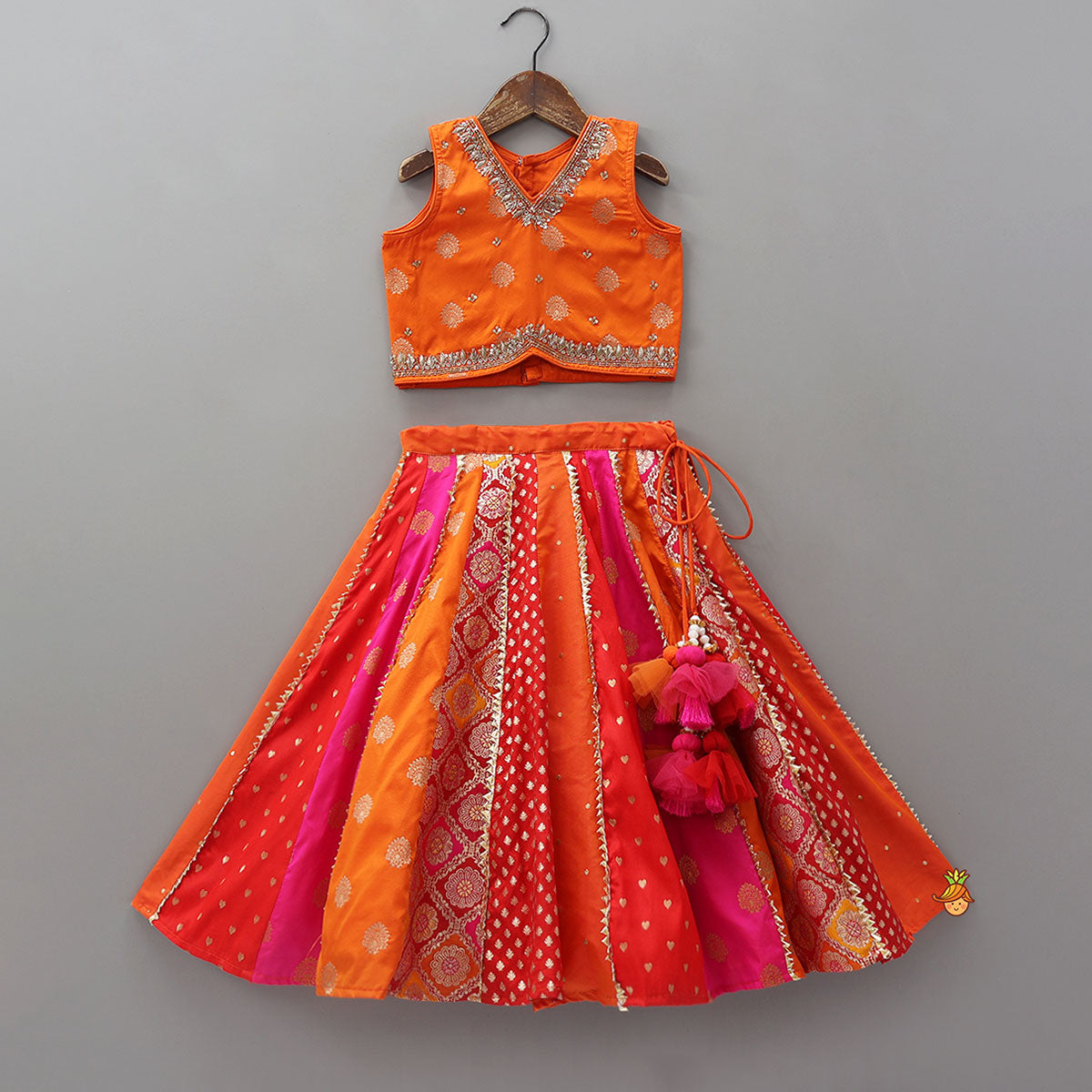 Pre Order: Embroidered Elegant Top And Brocade Lehenga With Matching Net Dupatta And Brocade Potli Bag