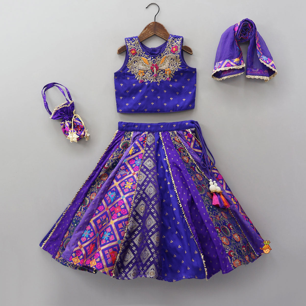 Pre Order: Gorgeous Embroidered Top And Brocade Lehenga With Matching Net Dupatta And Brocade Potli Bag