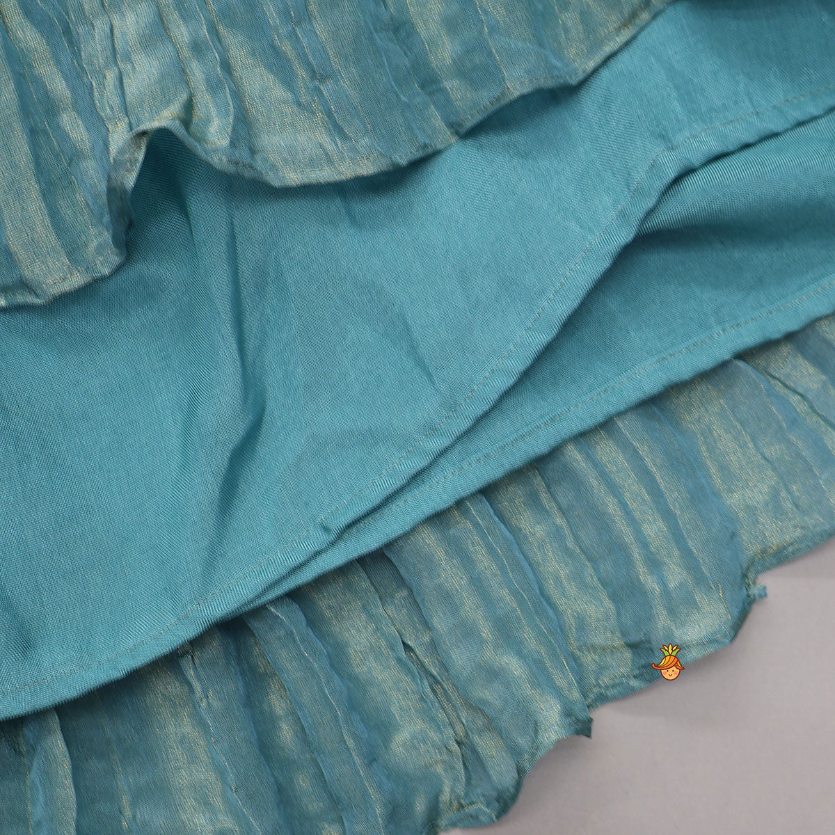 Heavy Embroidered High-Low Shimmery Top And Lehenga