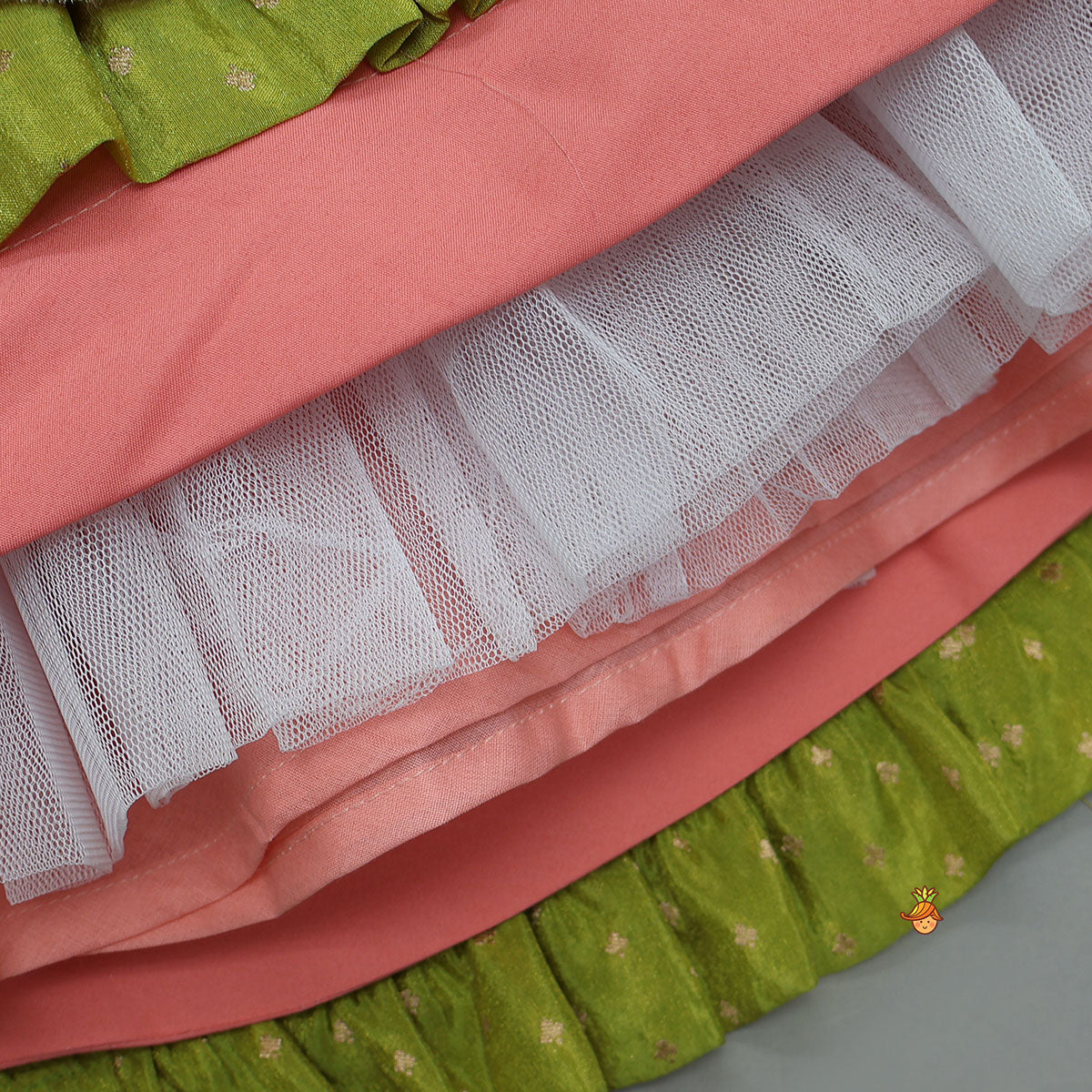 Pre Order: Pleated Armhole Elegant Top And Shimmery Lehenga With Matching Net Dupatta