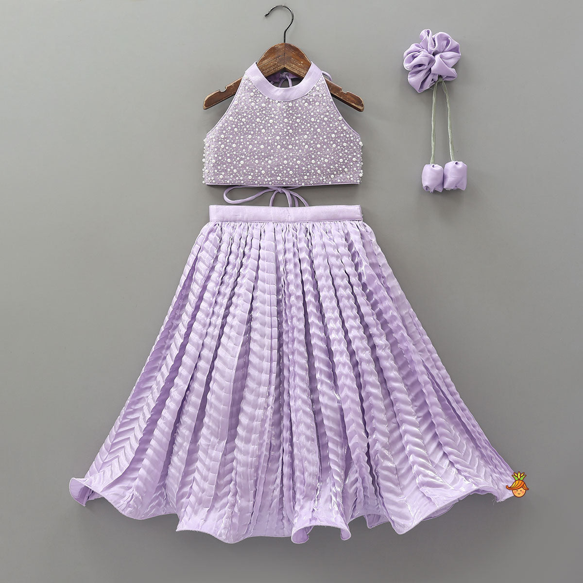 Pre Order: Stunning Criss-Cross Back Knot Top And Crushed Sheen Lehenga With Matching Hair Tie