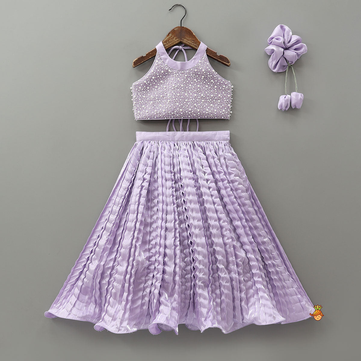 Pre Order: Stunning Criss-Cross Back Knot Top And Crushed Sheen Lehenga With Matching Hair Tie