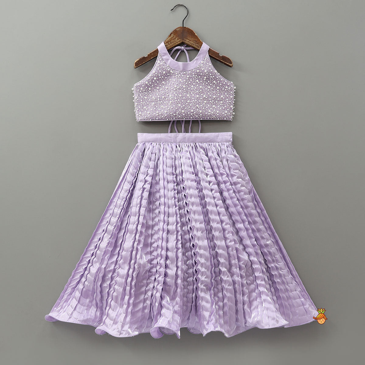 Pre Order: Stunning Criss-Cross Back Knot Top And Crushed Sheen Lehenga With Matching Hair Tie