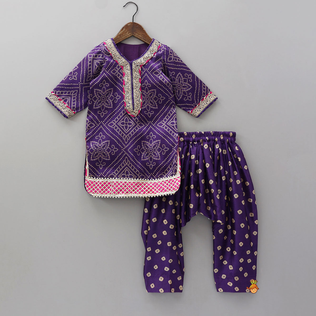 Bandhani Printed Kurti And Pleated Salwar With Matching Fringed Dupatta