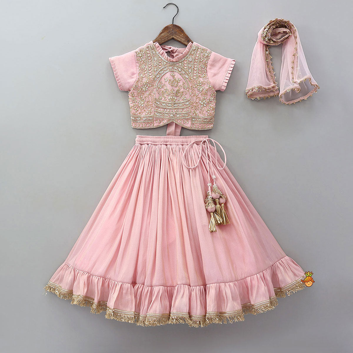 Pre Order: Triple Knot Detail Shimmery Top And Lehenga With Net Dupatta